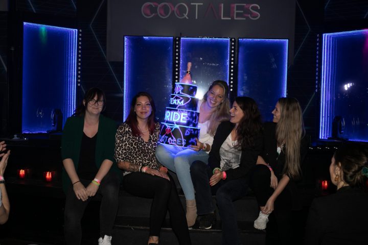 group of women posing for the camera